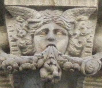 They are decorative motifs over some buildings main entrance (1 and 2) or at