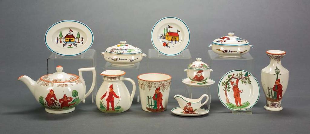 Top row: 550 (4) Bottom row: 551 (7) 551. Collection of Wedgwood Queen s Ware Brownies Pattern Items, England, c. 1913, each polychrome decorated brown transfers, including a teapot and cover, lg.