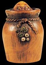 Barnacles cling to the sides of the octopus pot. Ivory and wood. Signed: Miwa.