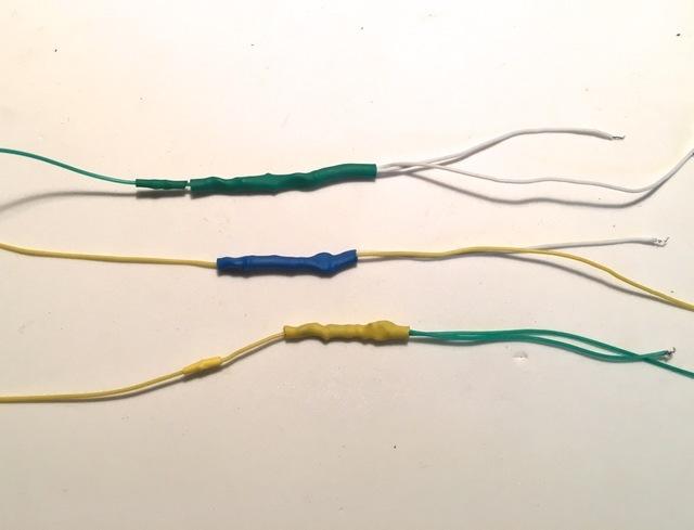 Find the end of each resistor that has two wires.