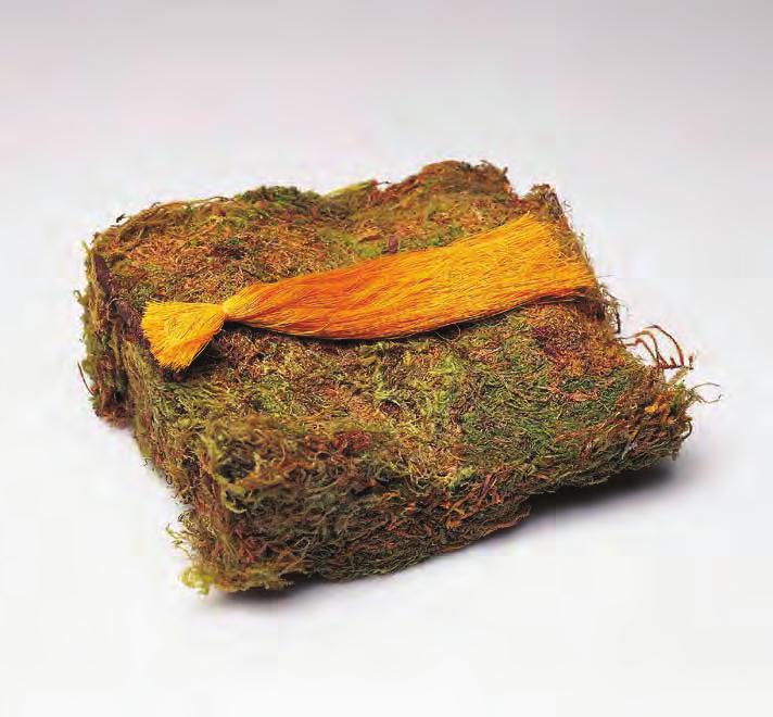 KAREN KILIMNIK Rapunzel, 1998 For Parkett 52 Spindle of gold thread (hair) on bed of moss (thread and moss are separately packaged to be assembled by