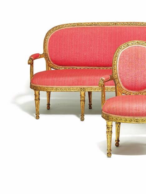 180 a fine danish louis XVi set of giltwood seat furniture, consisting of a sofa and four armchairs, round backs and seats, carved with running dog pattern, round tapered fluted legs. 18th century. l. 176 cm.