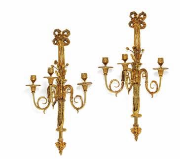 201 a pair of swedish gilt bronze wall light, each with three curved arms for candles, molded with openwork bows,