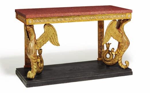 DKK 30,000 / 4,000 264 a large swedish empire giltwood and red granite console, decorated with