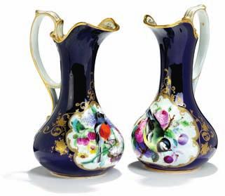 372 a pair of russian porcelain wine jugs, decorated in colours and gold with bird, berries and flowers in cartouche on bleu de
