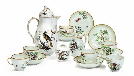 421 421 "The bird service" decorated in colours and gold with exotic birds on branches and insects, comprising of; 6 cups, 6 saucers, creamer, teacaddy and coffee-pot.
