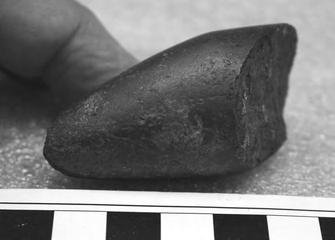 Mortuary Remains Recovered at the Palmer-Redondo Site (CA-LAN-127) 109 Figure 89. Broken magnetite charmstone (Item 101) recorded in the miscellaneous fill inventory, CA-LAN-127.