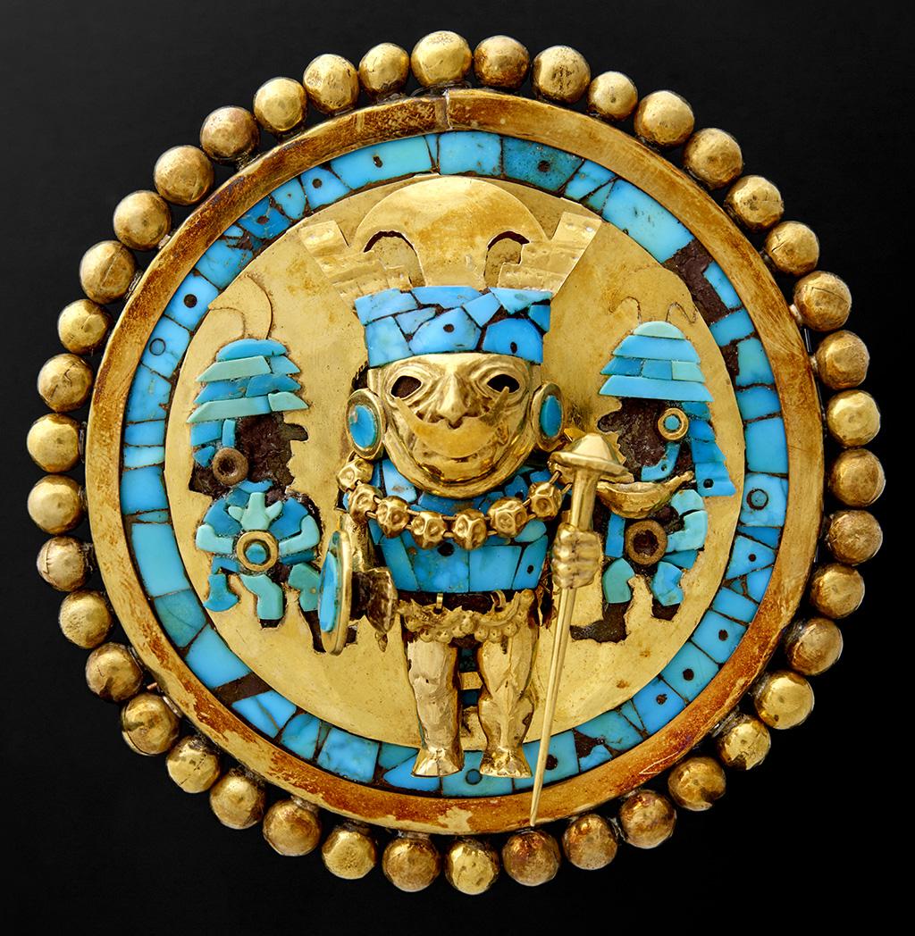 (/art/exhibitions/golden_kingdoms/images/explore/gm_357267ex1_x1024.jpg) Ear Ornament Depicting a Warrior, 640 680, Moche culture; gold, turquoise, wood.