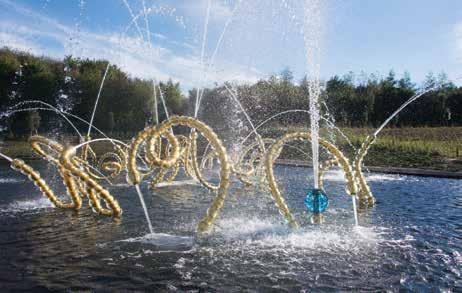 Arena Qatar On Sculpture Othoniel s three massive gilded fountain sculptures for the grove s ponds his most extensive and challenging artwork to date are made of 1,751 bowling ball-size blown-glass