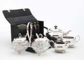 and other silver plated items such as a teapot (parcel) 69.