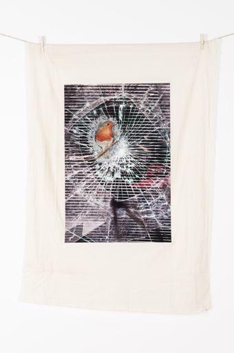 Layers represent a series of photographs glued onto cotton and then embroidered with delicates flowers or birds.