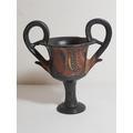 78. Antique 2 handled Greek lidded pot with traditional decoration Approx 8" tall and 7" dia 250-280 86.