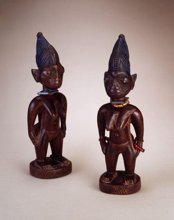 Fig. 6. Yoruba, Kisi or Old Oyo, Oyo region, Nigeria, Twin Commemorative Figures (Ère Ìbejì), early/mid-20th century. Wood, glass beads, and string, Left: 25.4 x 8.3 x 6.7 cm; Right: 25.4 x 7.6 x 6.