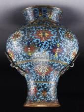 00 204 Chinese Ming cloisonne vase depicting lotus, with two free rings on each handle. 14"H x 11" Dia.