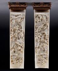 Large Chinese carved ivory wrist rests regulations prior to bidding) depicting figures in a landscape.