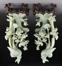 on a naturalistic carved wood base. Jade: 17"H, Circa - 20th C. 1,000.