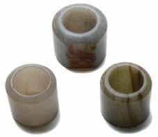 4 cm) Estimate: $800 / 1,200 6032 Three Jade Archer s Rings Comprising a thickly sectioned jade ring of grayish tone with russet inclusions to the flat side, and two celadon jade rings with faint