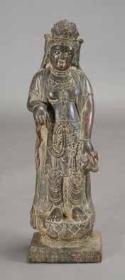 Lot 6086 Lot 6089 Lot 6090 6086 A Limestone Carving of Guanyin Carved standing on a lotus base, with the right arm raised and the left arm pendent holding a heart-shaped attribute, serene facial