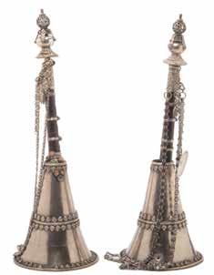 5 cm) Estimate: $1,200 / 1,800 6108 Two Tibetan Silver and Wood Gyaling The trumpet-like religious woodwind instrument with a long hardwood body decorated with silver