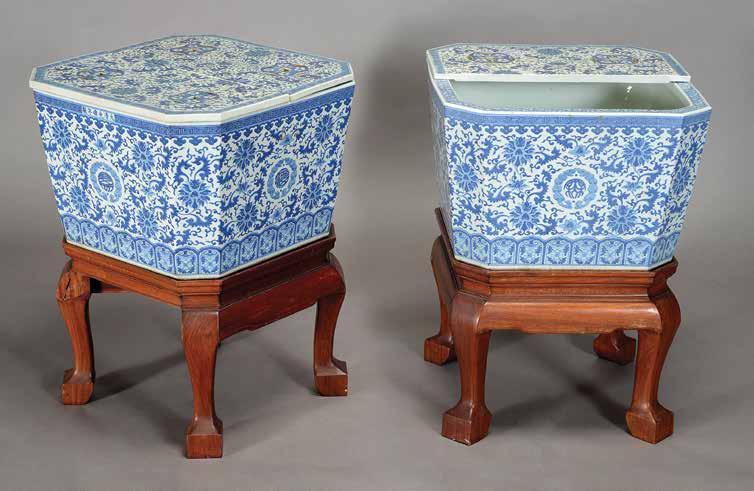 6163 A Pair of Underglaze Blue Lidded Ice Chests Guangxu Marks and of the Period Both of square form with flat corners, heavily decorated to all sides with leafy lotus scrolls surrounding stylized