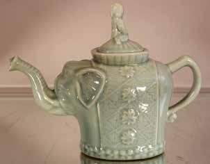 Lot #311- Celadon Chinese tea pot in the form