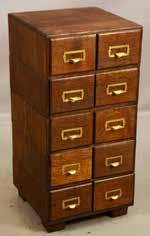 Lot #497- Arts & crafts oak smokers cabinet, 2 doors,