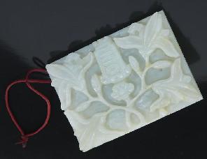 00 407 Chinese Ming carved jade belt buckle depicting magnolia and the character for longevity. 2.