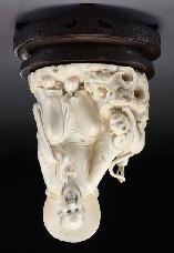 554 Chinese carved ivory figure depicting fuhn lohan, regulations prior to bidding) raised on a hard