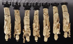 582 (7) Chinese Qing carved ivory God of Flowers, regulations prior to bidding) raised on wood stands.