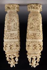 Chinese Qing carved ivory urns, regulations prior to bidding) each depicting landscapes and eight immortals,