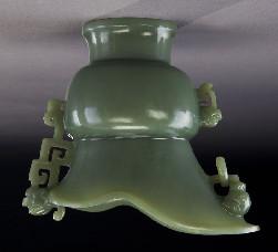 , Circa - 16th - 17th 673 Chinese carved celadon jade Jue cup, with three carved handles