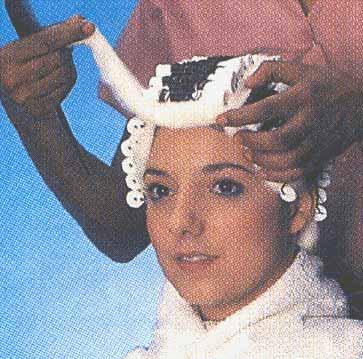 Preparing Your Client to Receive a Permanent Wave Give client a cape or smock.