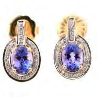 5 x 13 mm {Gross Weight: 8.6 dwts} 70 Pair of Tanzanite, Diamond, 18k Gold Earrings. Each featuring one oval-cut tanzanite weighing approximately 1.55 ct. and 1.65 ct.