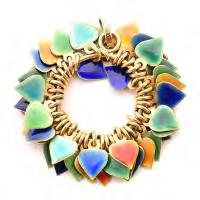 Featuring numerous blue, red, green, orange enamel heart tassels, suspended from an 18k yellow gold circle pendant, completed by a bail and measuring approximately 42 mm in length. {Gross Weight: 10.