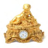 547 French Gilt Bronze "Amorin" Clock. Raingo Freres, Paris. Circa 1830-1840.