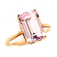 33 Kunzite, 10k Yellow Gold Ring. Featuring one emerald-cut kunzite weighing approximately 3.80 cts., set in a 10k yellow gold mounting.