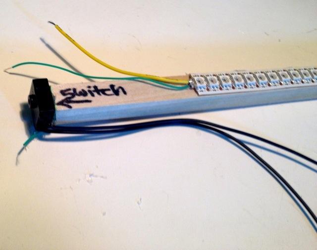 Twist the two data wires and the two clock wires together at each end of the staff. Find the end with the switch. Splice a long (3 foot) piece of color-coordinated wire to each twisted pair.