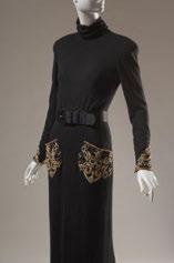 Bill Blass, evening sweater dress with belt, cashmere and satin, fall 1986, USA, The Museum at FIT, gift of Mrs. Savanna Clark.