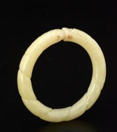 0214 NEPHRITE JADE BRACELET decorated with carved dragon.