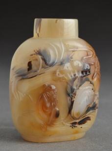 0301 AGATE BALUSTER SHAPE SNUFF BOTTLE with carved decor of figure under a pine tree.