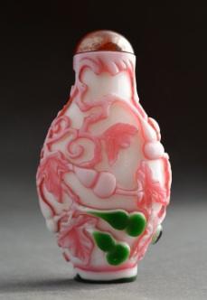 0317 NEPHRITE SNUFF BOTTLE decorated with carved decor of a fish and a flower, a bird on a branch on the