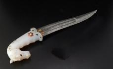 0069 INDIAN DAGGER, the handle in white celadon nephrite carved in the shape of a
