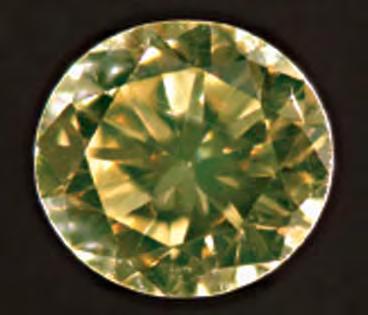 These contributors recently analyzed a small greenish brownish yellow ( olive yellow ) diamond that exhibited green transmission luminescence (figure 1) as well as an unusual combination of