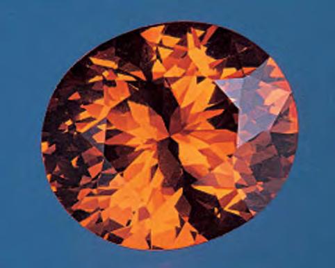 Figure 18. This group of yellow-orange to orange spessartines from Afghanistan ranges from 0.78 to 1.68 ct. Courtesy of Intimate Gems; photo by Maha Tannous. Figure 19.