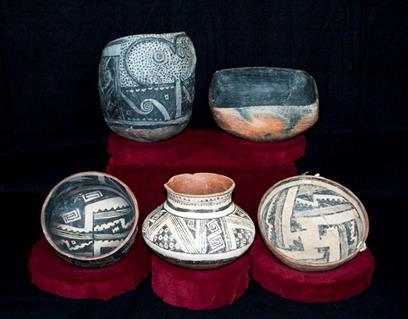 Polychrome ceramics. Ida Redbird, a famous Maricopa potter, firing ceramics.