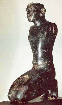 Fig. 7. Statuette of pharaoh Amenemhat III, found together with the crocodile of Fig. 6 in el Fayum, now in the collection Ortiz in Geneva. H.: 26.3 cm.