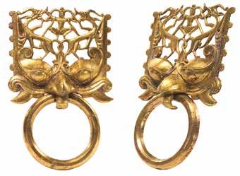 Fig. 13 (left). The gilt bronze ring handles from Tomb M1. Fig. 14 (below). A gilt bronze ring handle from Tomb M2. diameter and 1.6 cm wide.