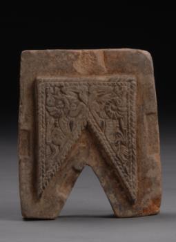 108. Inventory number: M34:14 Object title: Mould for ornament with double sheep design in bas-relief. Dimensions: Length 7.9cm; Width 6.7cm; Thickness 1.