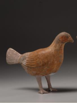 115. Inventory number: 007062 Object title: Figure of a hen Dimensions: Height 12cm; Length 15cm Material: Painted pottery Date made: Han Period (206 BCE 220 CE) Shaanxi Institute of Archaeology No.