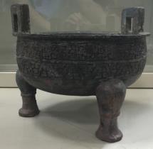 126. Inventory number: M3:11 Object title: Tripod Ding (vessel) with panhui (snake like animal) and ring pattern decoration Dimensions: Diameter 19.6cm; Length 16.